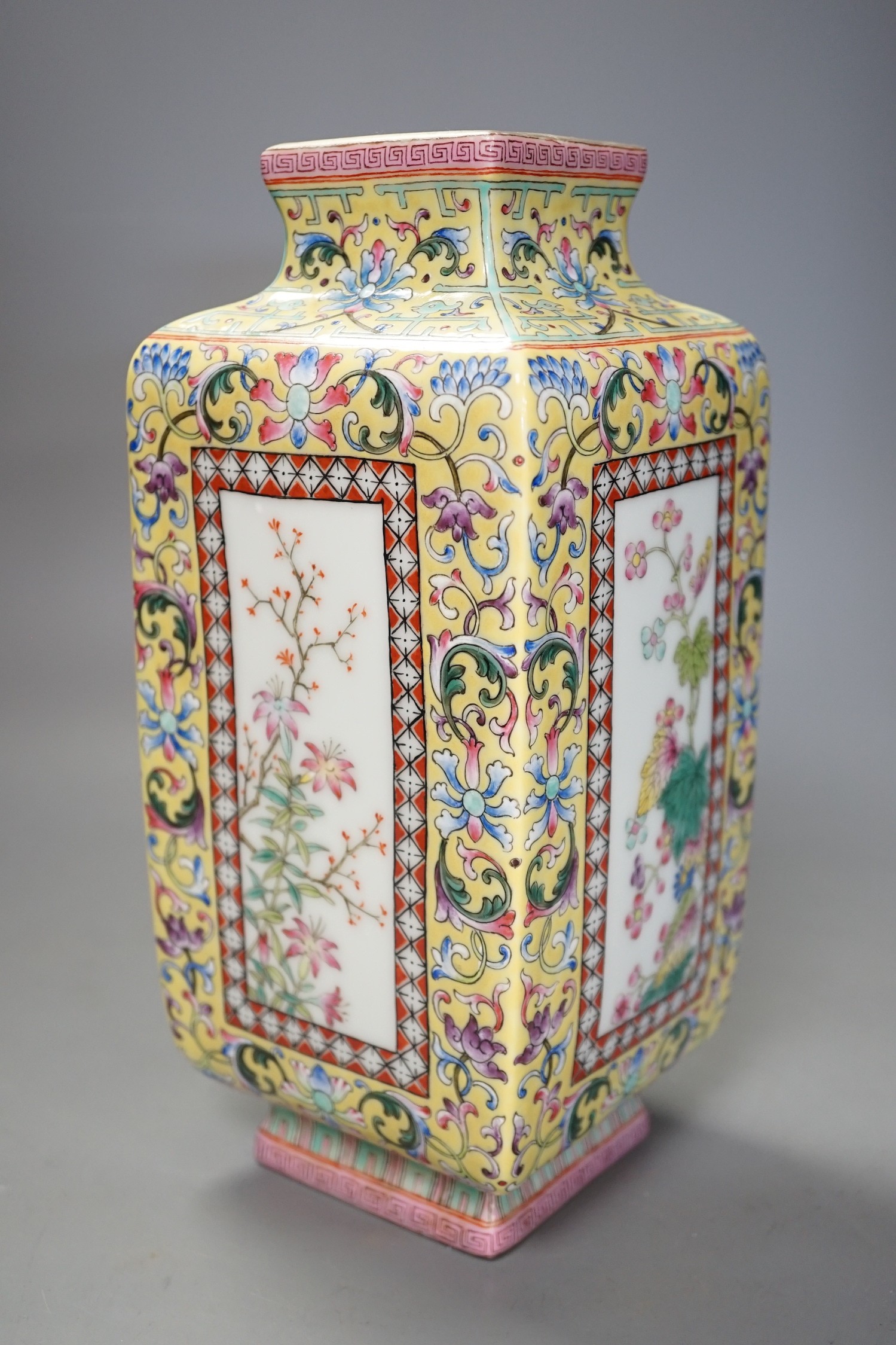 A Chinese yellow ground square floral vase, 27cm tall